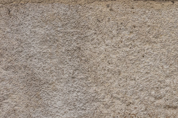 Beige plastered wall background