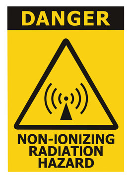 Non-ionizing radiation hazard safety area, danger warning text sign sticker label, large icon signage, isolated black triangle over yellow macro closeup 