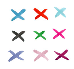 The crosses with different colors of watercolor