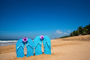 flip flops on a tropical beach