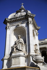 Fototapeta na wymiar Fountain in front of Church of Saint-Sulpice, Paris
