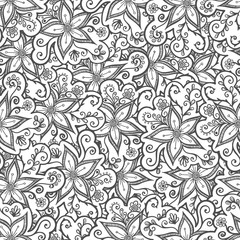 Doodled seamless vector pattern from flowers.  Endless vector background nature theme. Hand drawn floral abstract pattern