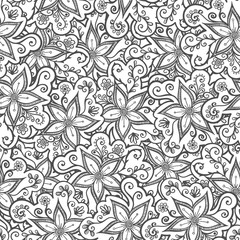 Doodled seamless vector pattern from flowers.  Endless vector background nature theme. Hand drawn floral abstract pattern