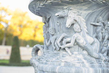 Fototapeta na wymiar Stone vase decorative, stone sculpture at the Jardin del Retiro