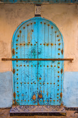 Old traditional doorway in the Moroccan town of Essaoira.