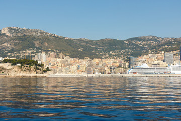 Obraz premium Color DSLR stock image of luxury apartment building and condominiums in Monte Carlo, Monaco, on the French Riviera. Horizontal with copy space for text 