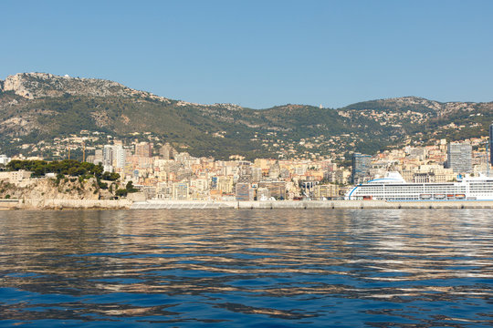 Color DSLR stock image of luxury apartment building and condominiums in Monte Carlo, Monaco, on the French Riviera. Horizontal with copy space for text
