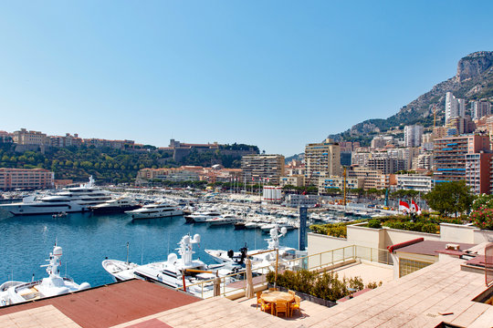 Color DSLR image of yachts in Monte Carlo harbor, in the principality of Monaco on the Mediterranean coast of the French Riviera.  Horizontal with copy space for text