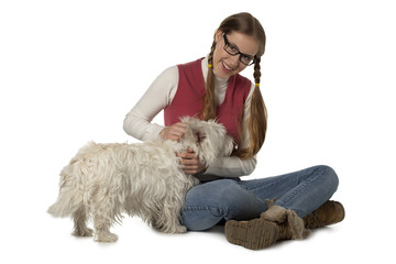 woman with playing with her dog