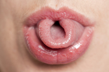 woman playing her tongue