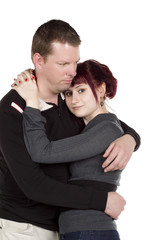 man and woman hugging