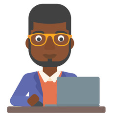 Man working at laptop.