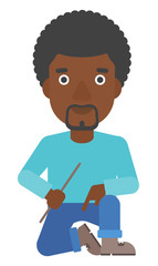 Smiling man sitting.