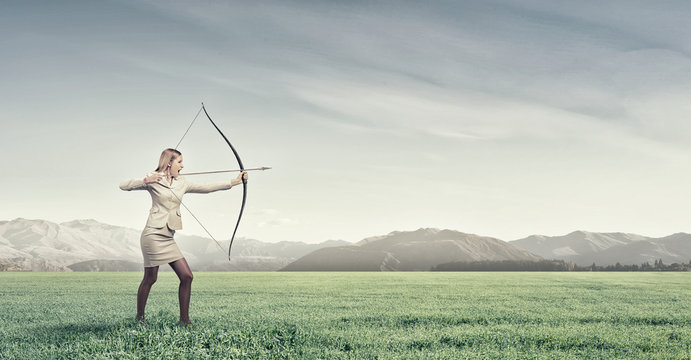 Woman aiming her goal