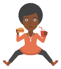 Woman eating hamburger. 
