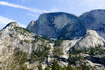 Fototapeta na wymiar Half Dome and Ahwiya Point in Yosemite National Park in Spring with blue sky