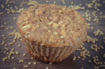 Vintage photo, Fresh muffin with millet groats, cinnamon and apple baked with wholemeal flour, delicious healthy dessert