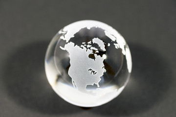 Crystal globe on black background