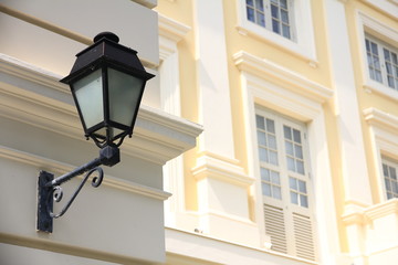 Fototapeta na wymiar Street Lamp with Heritage Building