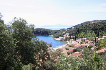 Fototapeta na wymiar Holiday resort with villa beach sea olive trees and islands 