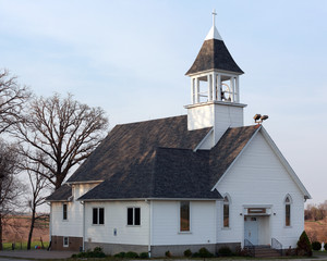 Fototapeta na wymiar Country church with bell tower