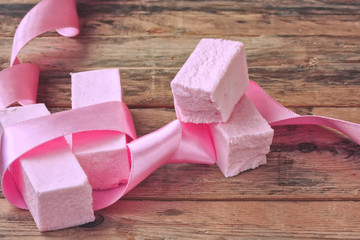 Pink sweet pastille with silk ribbon