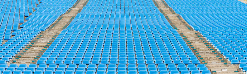 Fototapeta premium empty blue plastic grandstand seats or stadium seats, pattern with number