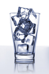 Glass with ice on a black background