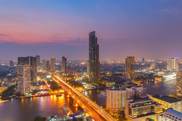 Fototapeta na wymiar Bangkok Cityscape, Business district with high building at night time, Bangkok, Thailand