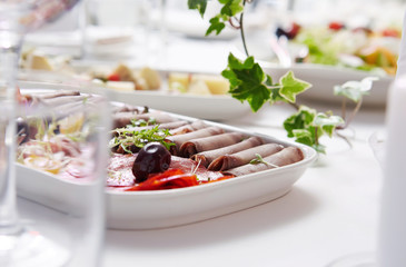 Served table with different meals.