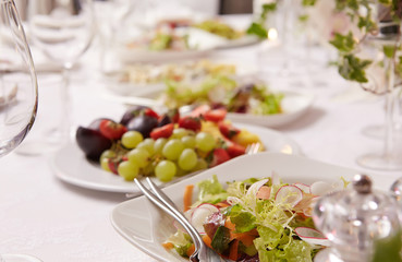 Served table with different meals.