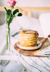 Breakfast in bed. Woman morning concept