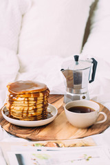 Breakfast in bed. Woman morning concept
