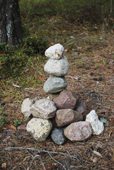 Figure from stones in the woods. New relaxing entertainment.