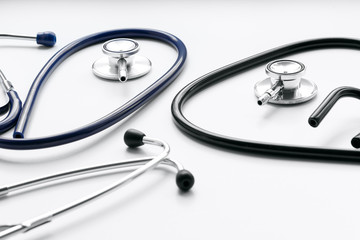 two disassembled stethoscope in white background