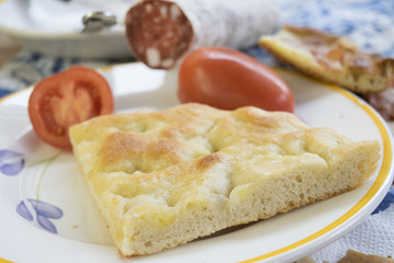focaccia with tomatoes and salami
