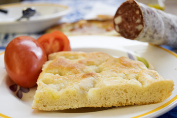 focaccia with tomatoes and salami