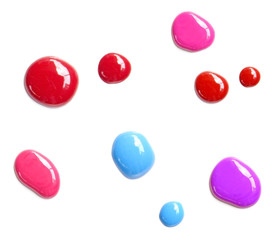 Blots of nail polish isolated on white background
