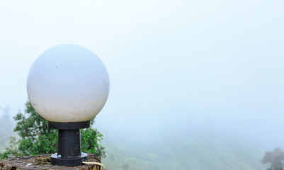 old lamp closup photo outdoors in mountain.