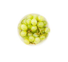 Grapes green, berries in a bowl on a