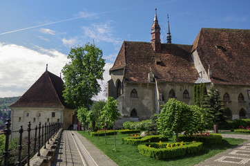St. Joseph's Roman Catholic Cathedral and tower of stronghold in Sighisoara old town ,Transylvania, Romania