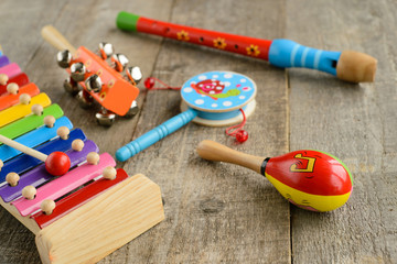 toy Musical instruments on wooden background