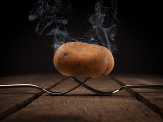 Hot potato on forks - Powered by Adobe