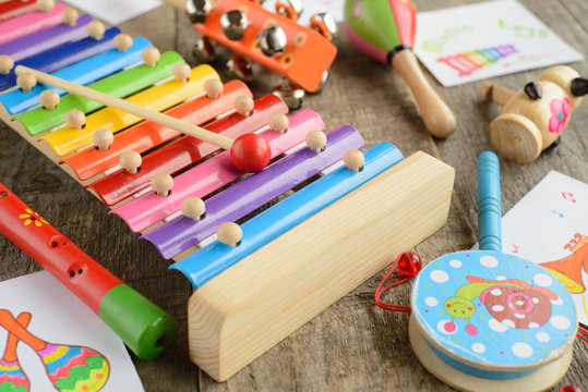 toy Musical instruments on wooden background