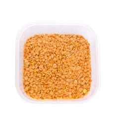 Split red lentil isolated on white