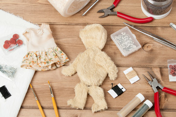 Fototapeta na wymiar Soft Toy Creation Process. Teddy Style Bear. Sewing Accessories.