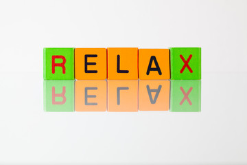 Relax - an inscription from children's blocks