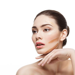 Obraz premium Girl with foundation cream on face