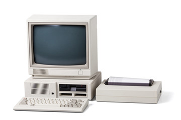 Old personal computer on white background