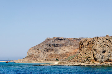 Old pirate fortress on the island Gramvousa on the background of the Mediterranean sea and blue sky.